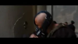 man wearing gas mask and backpack — Batman: The Dark Knight Rises