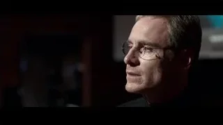 Man with glasses in dimly lit room — Steve Jobs