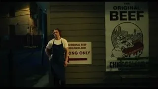 Man in apron by Chicago King sign — The Bear