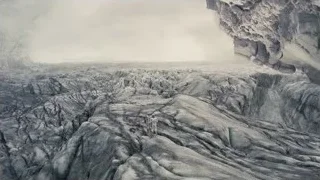 people walking on foggy rocky mountainous terrain — Interstellar