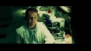 man working in dimly lit laboratory — Limitless