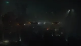 futuristic city with tall tower at night — Blade Runner 2049