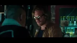 two men conversing in dimly lit bar — Deadpool