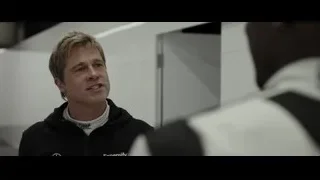 man in Mercedes jacket laughing — F1