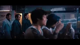 group of people in dimly lit bar — John Wick: Chapter 4