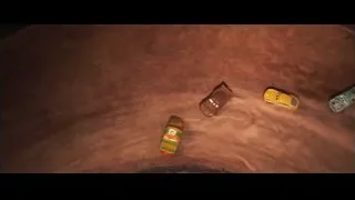 three cars racing on dirt track at night — Cars 3