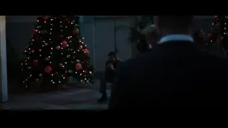 Man sitting by Christmas tree — Iron Man 3