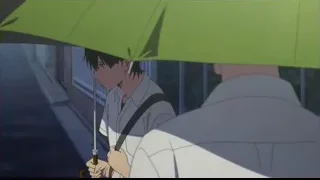 Man holding green umbrella in rain — I Want To Eat Your Pancreas