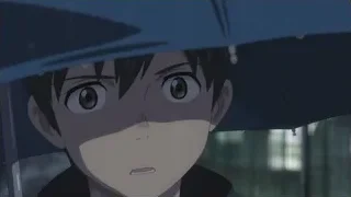 young boy holding blue umbrella in rain — Weathering with You