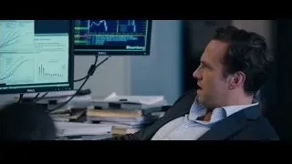 man in suit in control room — The Big Short