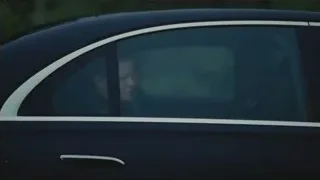 man and woman reflected in car window — Succession