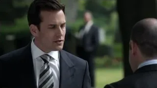 Man in suit standing in park — Suits