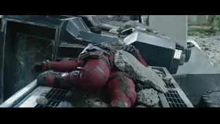 Deadpool in red suit with swords — Deadpool 2