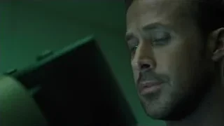 Man with beard looking at tablet — Blade Runner 2049