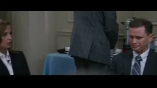 Man and woman conversing at table — The Big Short