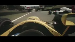 yellow race car speeding on track at night — F1