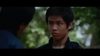 Young Asian man deep in thought outdoors — Bruce Lee: Enter The Dragon