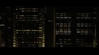 Lit up city buildings at night — Spiderman: No Way Home