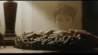 young boy praying in dimly lit room — Life of Pi