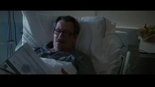 Man in hospital bed reading — Batman: The Dark Knight Rises