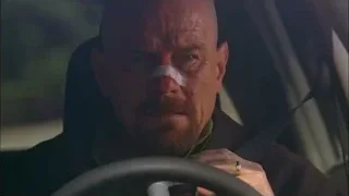 Bald man driving car with bandage — Breaking Bad