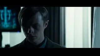 man in suit with closed eyes in dim room — The Amazing Spider Man 2
