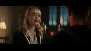 woman and man in dimly lit room — The Amazing Spider Man 2