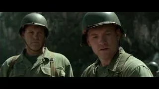 two soldiers in military uniforms on rocky cliff — Hacksaw Ridge