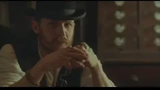 Man in top hat holding glasses — Peaky Blinders