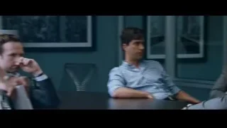 two men talking in a dimly lit office — The Big Short