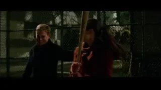 Young woman holding baseball bat at fence — Bruce Lee: Birth of The Dragon