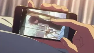 Hand holding smartphone in bedroom — Your Name