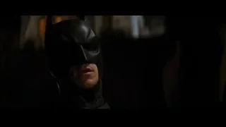 Batman face close-up in dimly lit room — Batman: The Dark Knight Rises