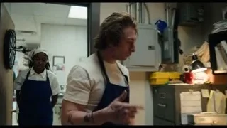people in kitchen with aprons and headscarves — The Bear