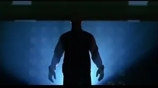 Person in red hoodie standing on stage — Spider Man