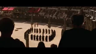 crowd gathered in large arena with stage — Gladiator