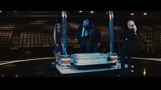 people on stage with metal structure — Now You See Me