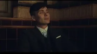 young man in dark suit looking up — Peaky Blinders