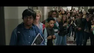 Young man holding book in hallway — Spiderman: No Way Home