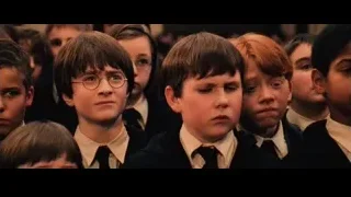Boys in uniforms standing in line — Harry Potter and the Philosophers Stone