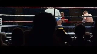 two boxers fighting in ring with referee — Southpaw