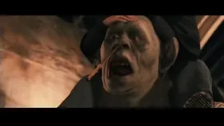 Person's distressed face with eyes closed — Harry Potter and the Philosophers Stone