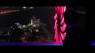 person looking at city night view — Now You See Me 2