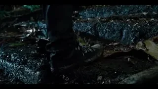 Person walking on stairs in dark forest — Jurassic World