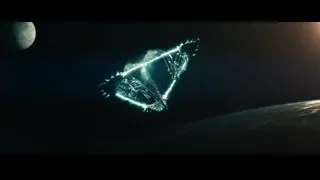 Futuristic spaceship flying over planet — Superman: Man of Steel