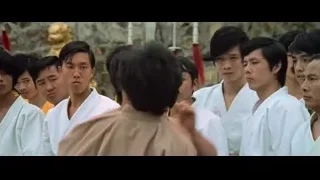 young men in karate uniforms outdoors — Bruce Lee: Enter The Dragon