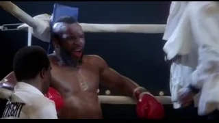 Men boxing in a ring — Rocky III