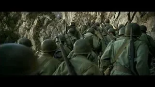 soldiers walking through rocky tunnel — Hacksaw Ridge
