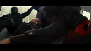 Man in hoodie dragged by man in gas mask — Batman: The Dark Knight Rises