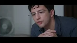 man with glasses deep in thought — The Big Short